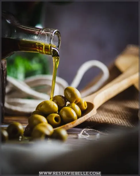 Apply Virgin Olive Oil To Hair to get rid of brassy hair